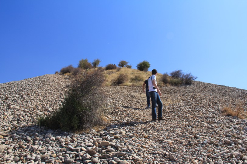 Sliding down the burial mound