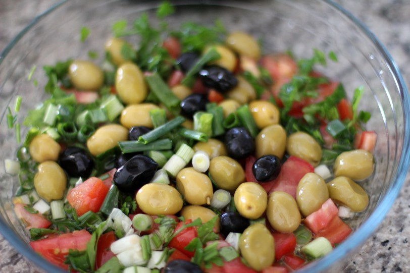 Salad of olives, tomatoes, parsley and green onions