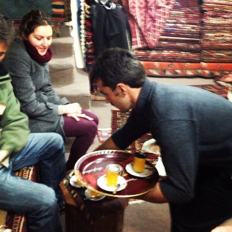 Taking tea while rug shopping