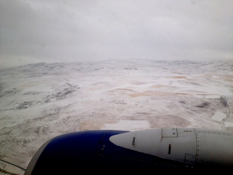 Our plane finally flies low enough to see something through the thick fog ... and this is what I see! 