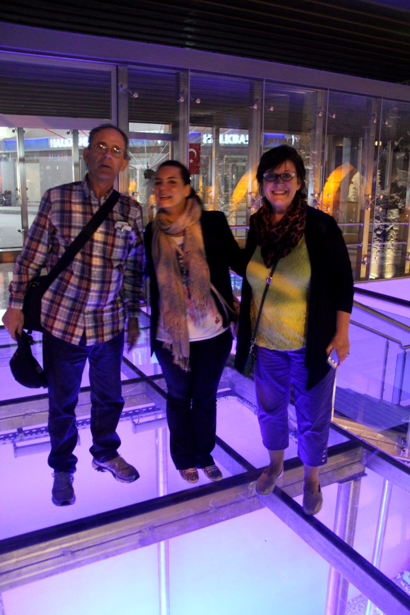 Walking carefully on the glass floor over ruins at the site of Daniel's tomb