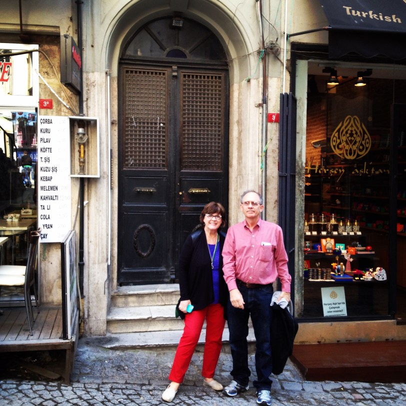 My parents in front of our apartment for a few days
